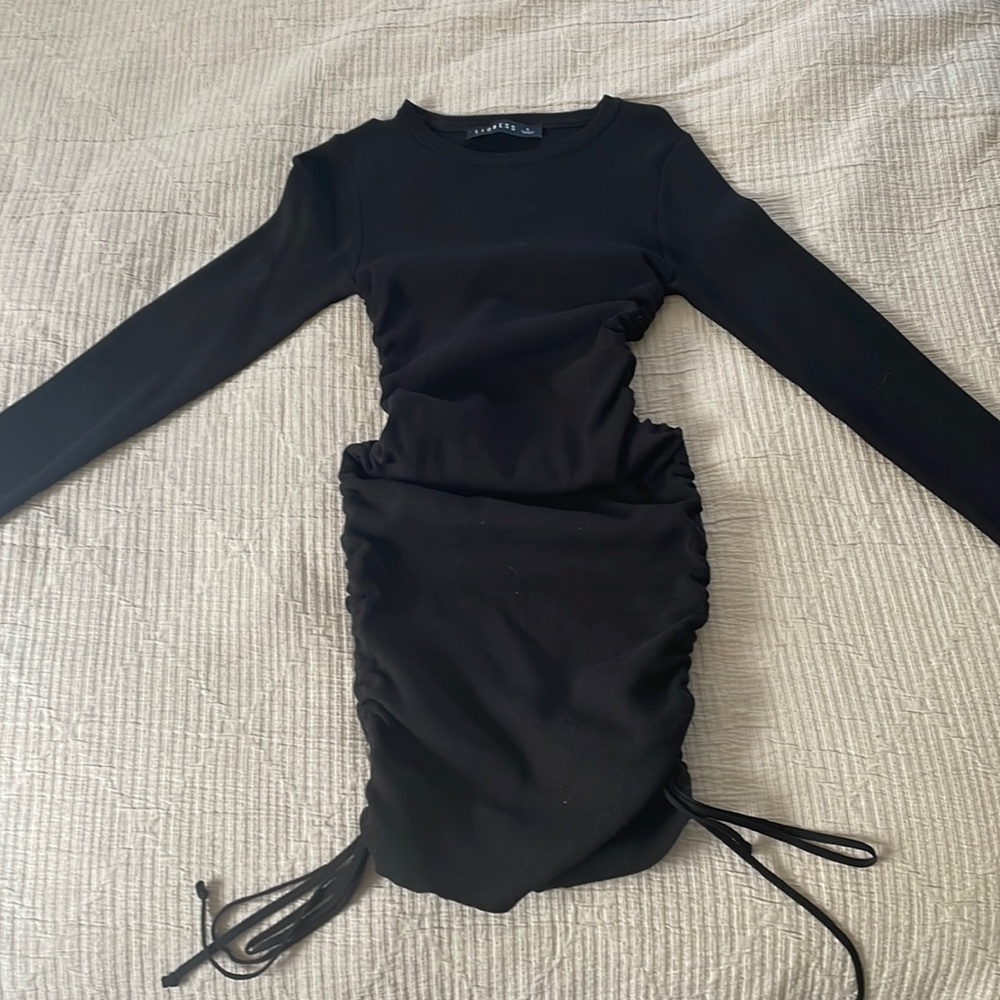 Black Lioness mini dress with cinched sides